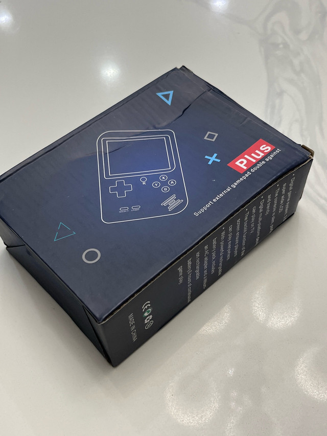 Handheld game pad Console