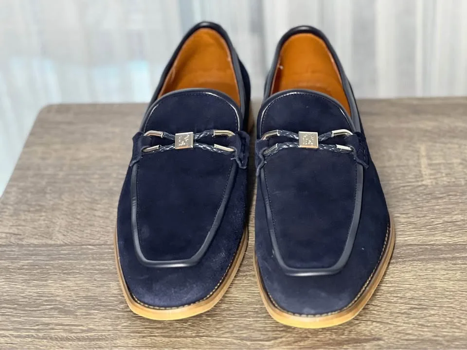 Pair of navy suede loafers. image indicator(2)