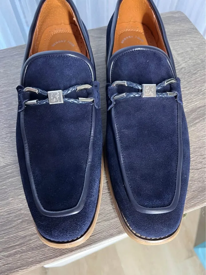 Pair of navy suede loafers. image indicator(4)