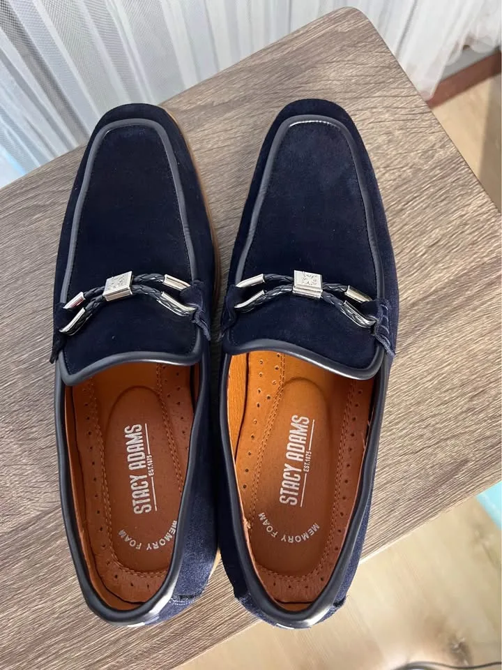 Pair of navy suede loafers. image indicator(5)