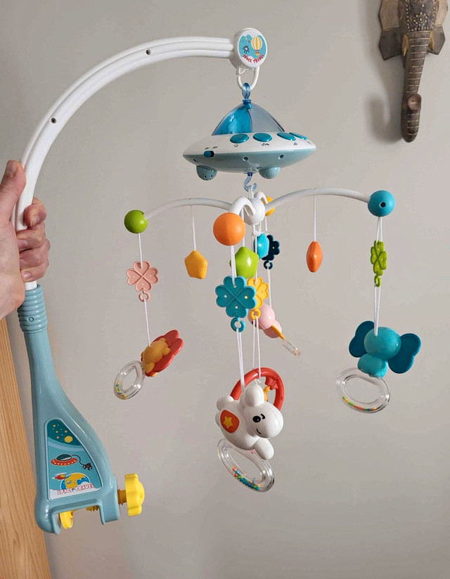 Baby crib mobile with music and light