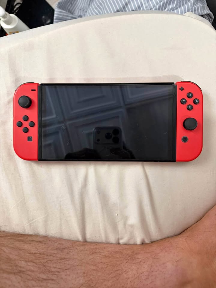 Nintendo Switch OLED — Mario Red Edition + Accessories
