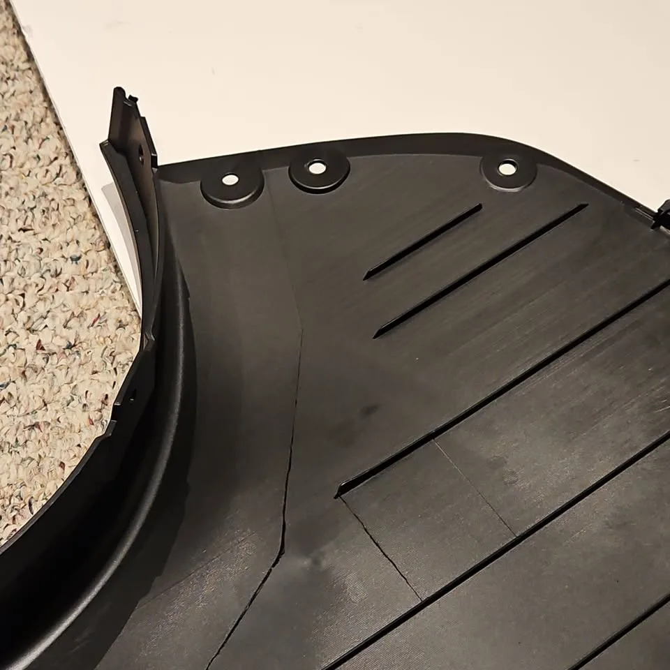 Tesla [hidden information]-C Model Y rear bumper under body lowe image indicator(4)