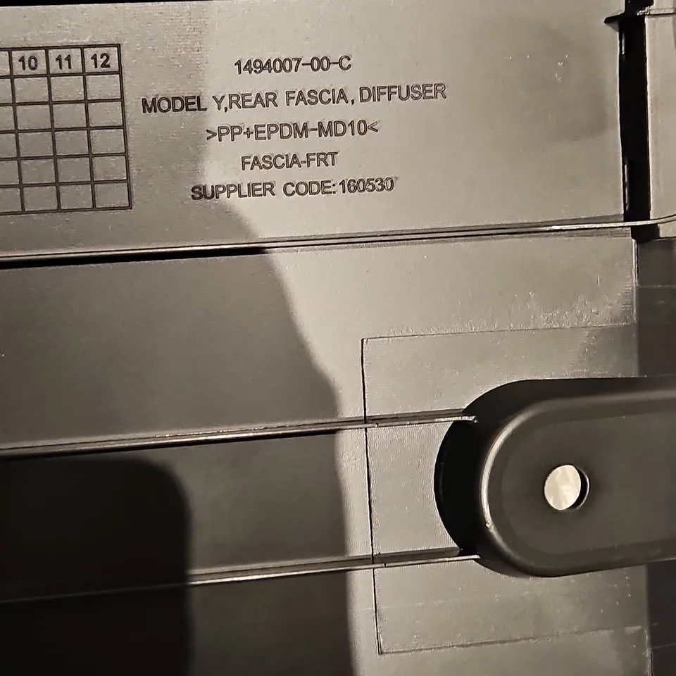 Tesla [hidden information]-C Model Y rear bumper under body lowe image indicator(6)