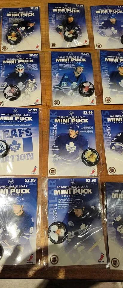 Toronto Maple Leafs Mini Pucks 2003/2004 full set of 28 pucks image indicator(3)