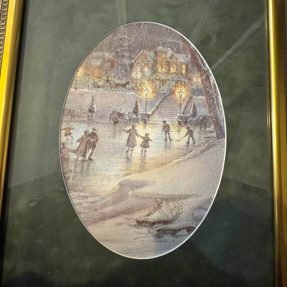 a print of the painting "Evening Skaters" by Canadian artist Tri