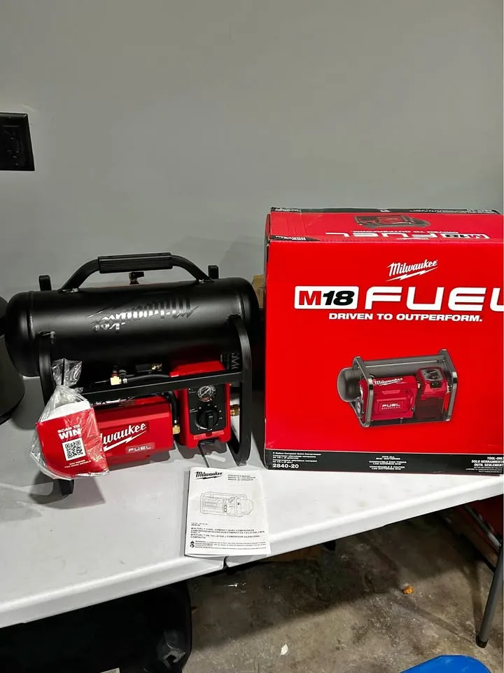 Milwaukee 2 gallon compact quiet compressor NEW condition - in b
