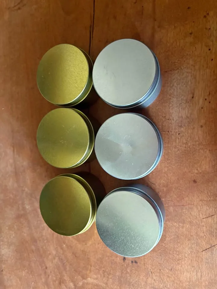 Small metal tins