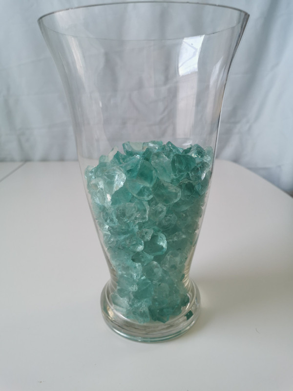 Vase complimented with cut crystal turquoise
