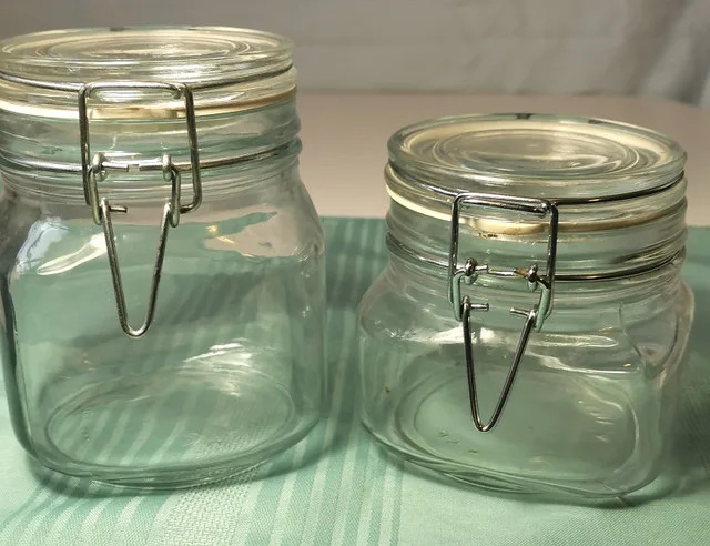 Two clear glass jars with hinged metal clasps thumbnail