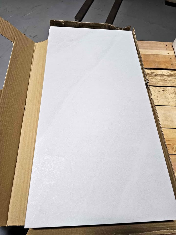12 X 24 tiles Bone color 28 sqft 2 boxes total
