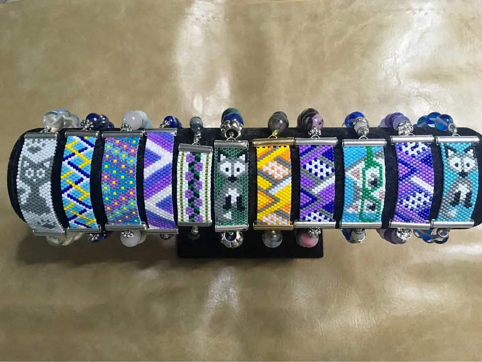 Stone stretch bracelets with hand beaded centres