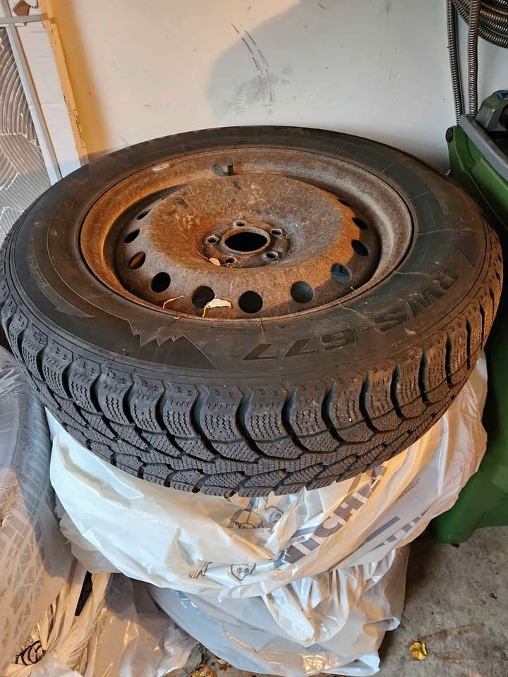 Winter Tires 235 65 R18 Rovelo w/ steel rims (used) - full set (