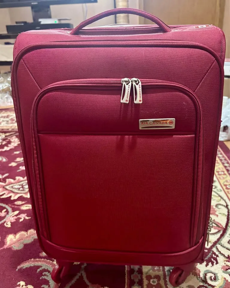 Air Canada + American Flyer + Travelpro Carry-On Luggage image indicator(2)