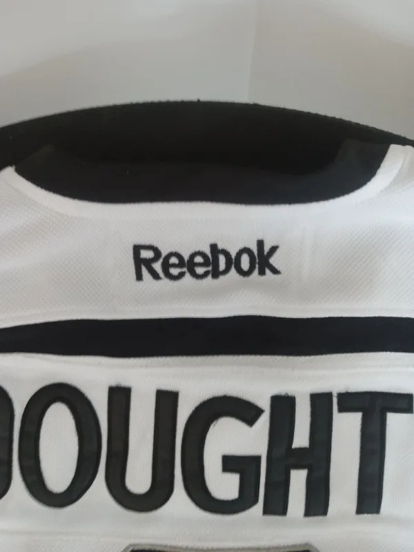 DREW DOUGHTY #8   LA KINGS  WHITE JERSEY  NHL image indicator(4)