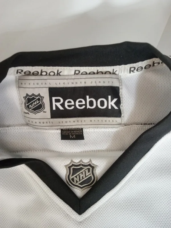 DREW DOUGHTY #8   LA KINGS  WHITE JERSEY  NHL image indicator(6)