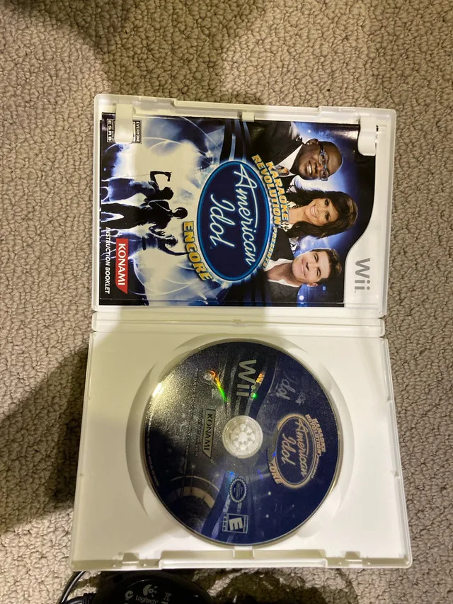 Nintendo Wii- American Idol Karaoke Revolution Encore game w/ M image indicator(2)