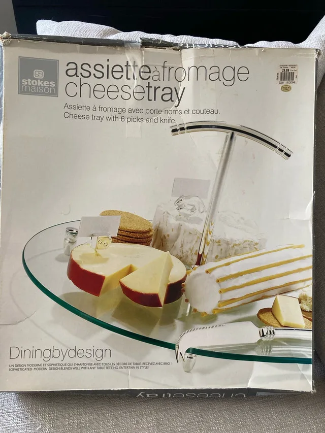 Brand new cheese tray with picks and knife thumbnail