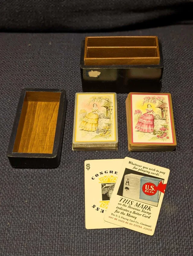 Vintage girls in dress playing cards image indicator(3)