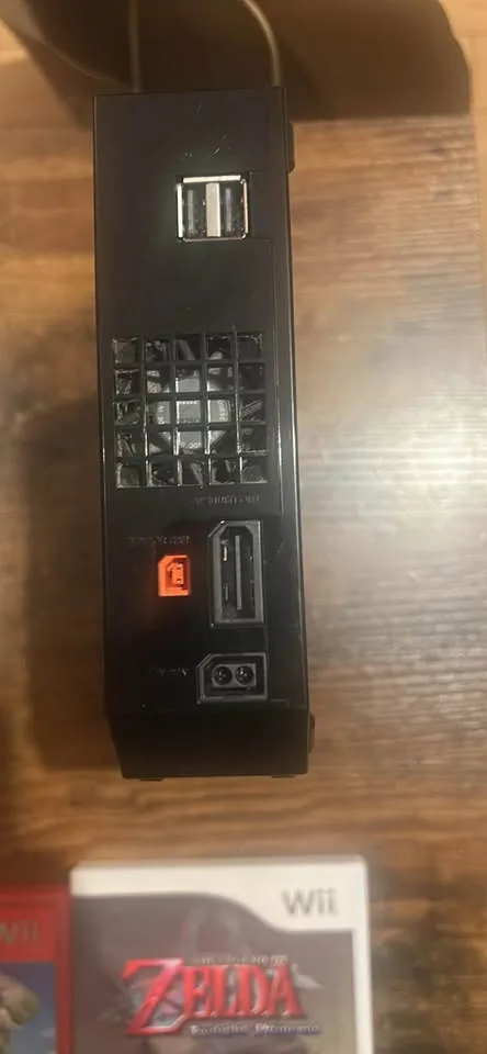 Black Wii console bundle w/ Wii mote , nunchuck + 5 games image indicator(6)