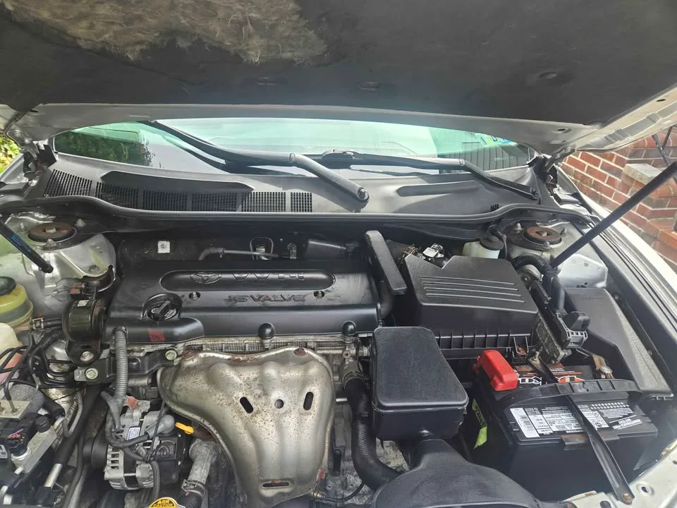 2009 Toyota Camry · LE Sedan 4D image indicator(2)