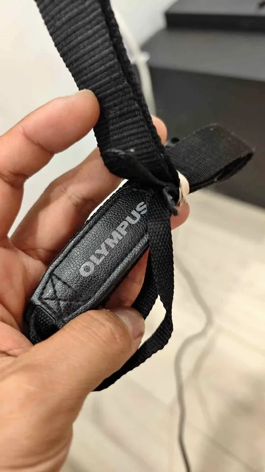 Camera necklace strip