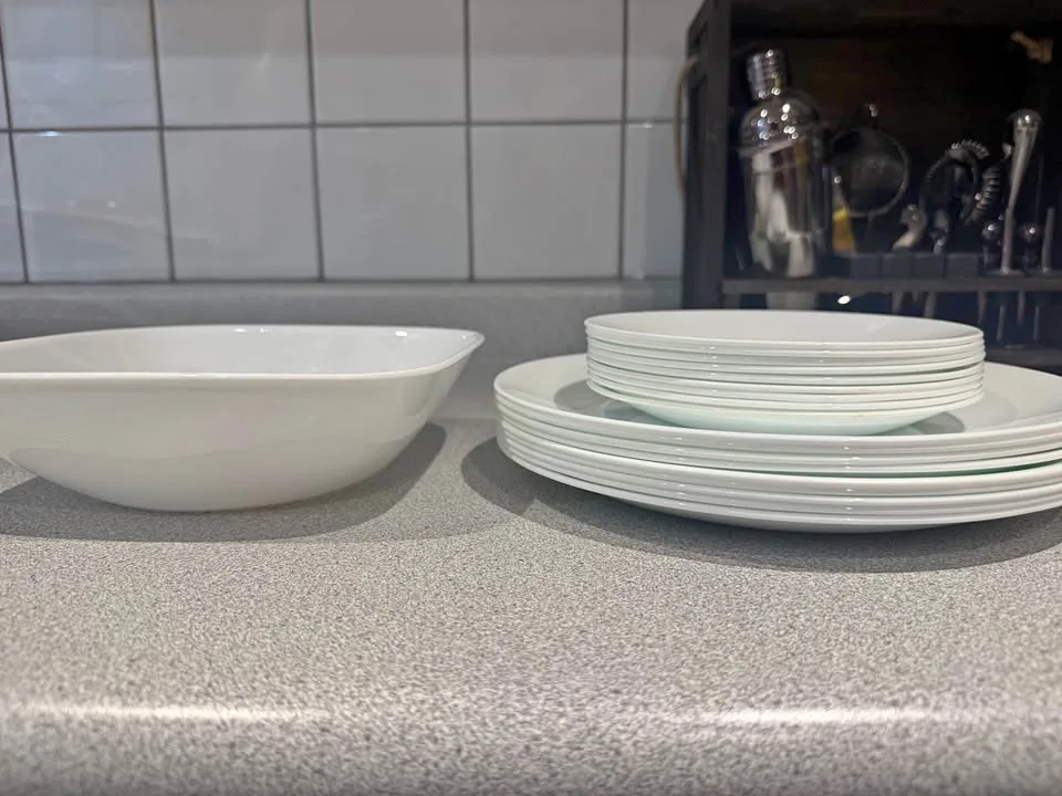 White plates and serving bowl