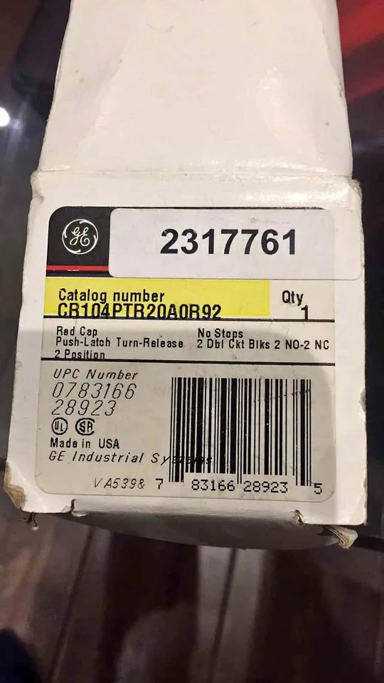 GE push latch turn release button