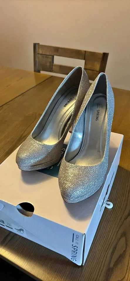 Silver glitter call it spring ￼Magnia size 9