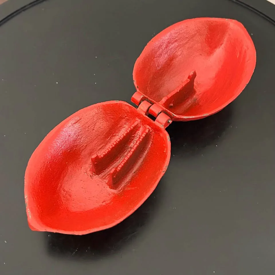 Vintage Cast Iron Nutcracker in Walnut Shape – Christmas Decor image indicator(4)