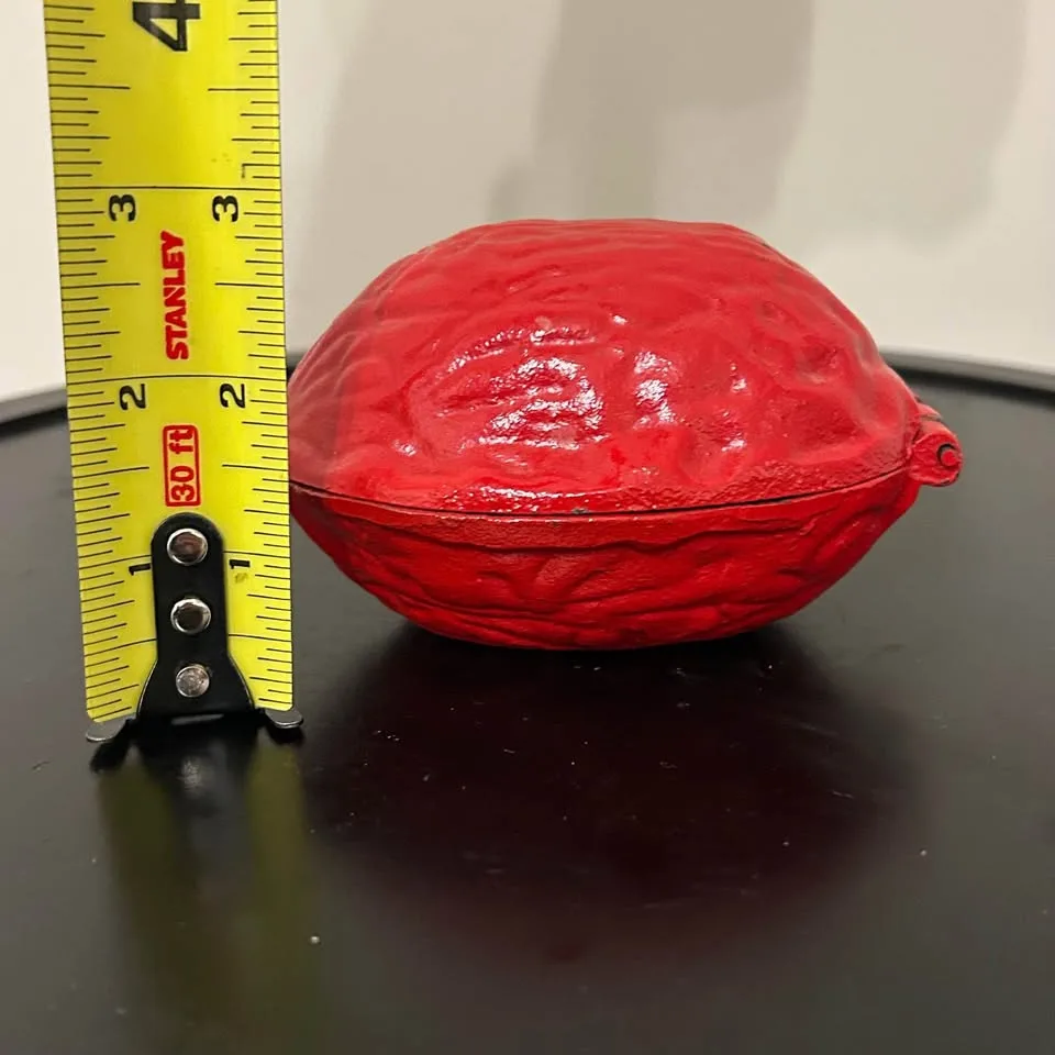 Vintage Cast Iron Nutcracker in Walnut Shape – Christmas Decor image indicator(7)