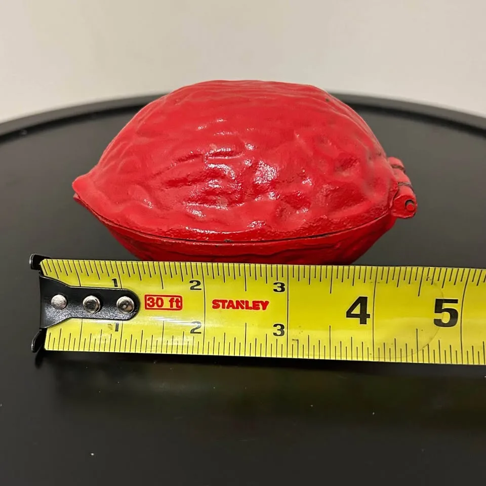 Vintage Cast Iron Nutcracker in Walnut Shape – Christmas Decor image indicator(8)