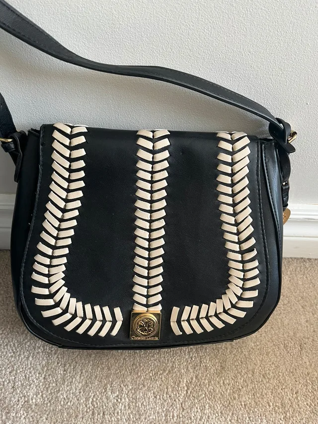 Like new Black and white saddle crossbody bag -$35 image indicator(2)