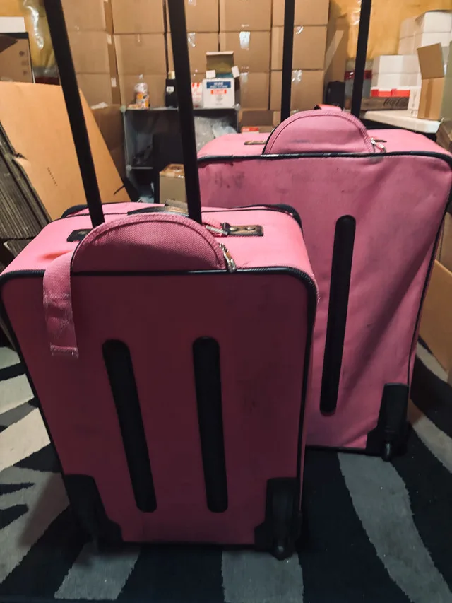 Set of 2 pink rolling luggage -$75 image indicator(4)