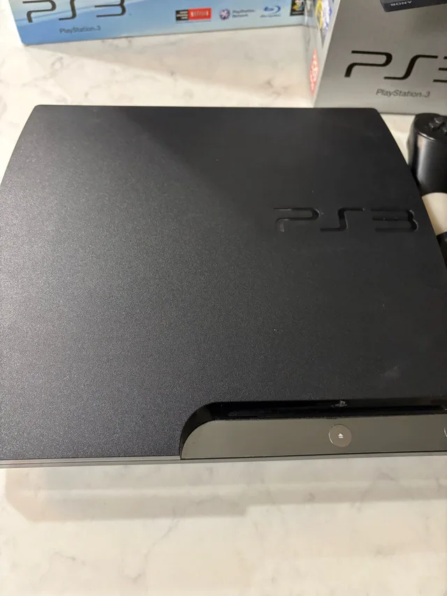 PS3 PlayStation console with Move Sports champions Bundle image indicator(4)