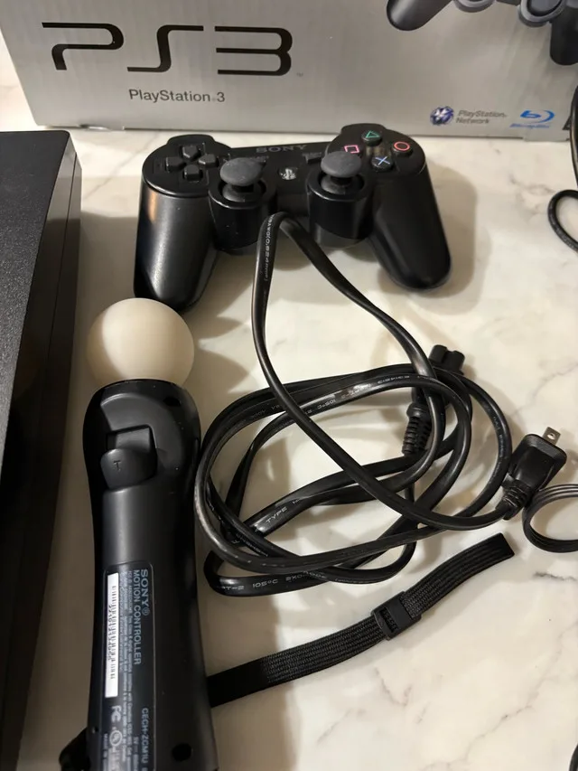 PS3 PlayStation console with Move Sports champions Bundle image indicator(5)