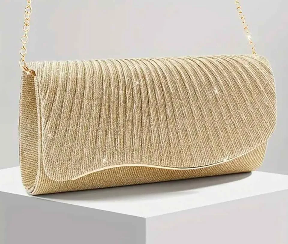 Brand new golden color shiny evening party purse ( firm price) image indicator(2)