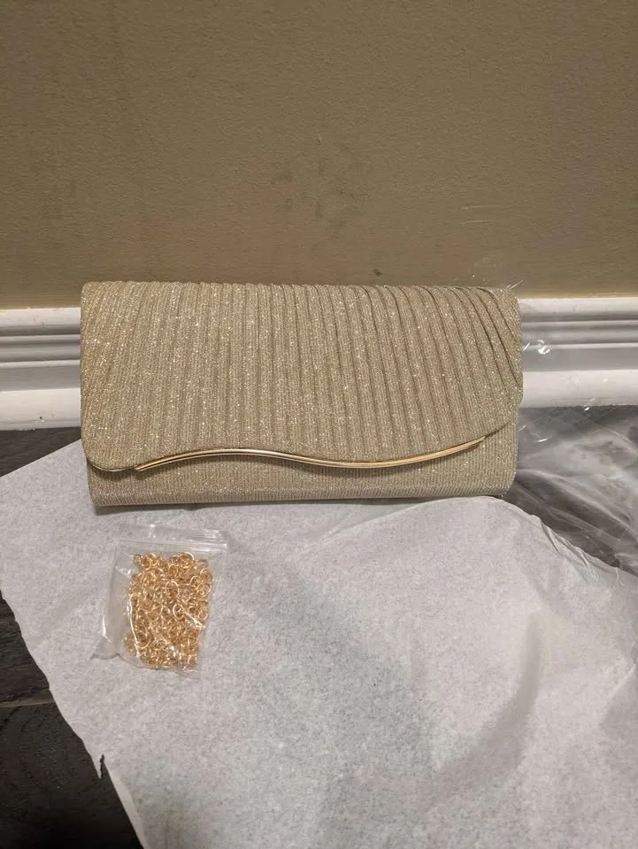 Brand new golden color shiny evening party purse ( firm price) image indicator(3)