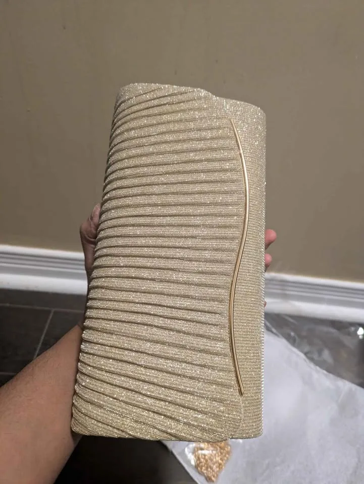 Brand new golden color shiny evening party purse ( firm price) image indicator(6)