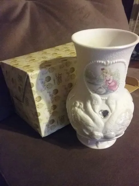 Precious moments girl with swan vase