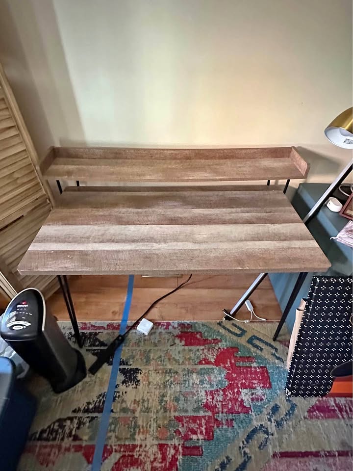 Computer desk with riser