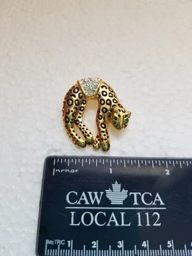 Vintage Leopard Rhinestone brooch with green eyes. Overall good image indicator(5)