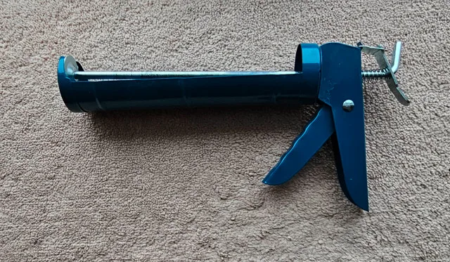 BRAND NEW Caulking Gun thumbnail