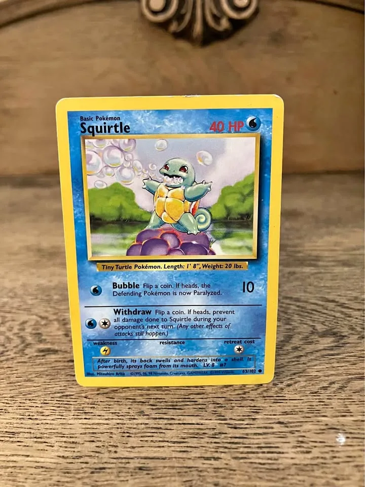 Squirtle 63/102 Pokemon Base Set 1999 thumbnail