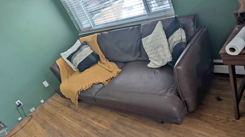 Real leather deep 3 seater sofa, good used condition