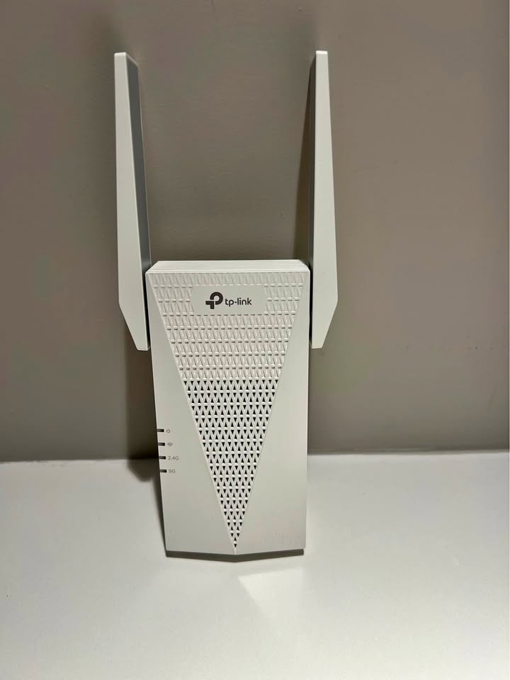TP-Link AX3000 Mesh WiFi 6 Extender, model RE715X