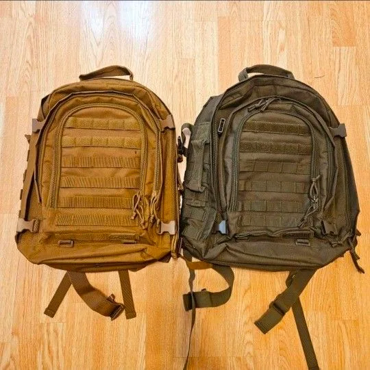 Pair of large laugage type carry-on backpacks