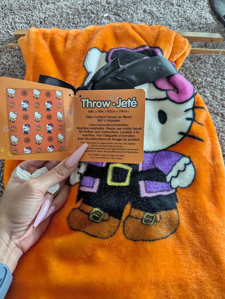 Hello kitty Halloween theme orange blanket yes it's available if