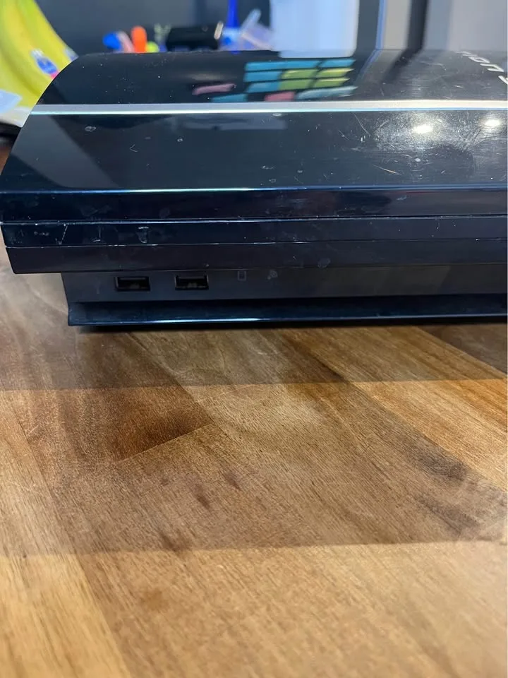 PlayStation 3 Bundle (Console + Cables + 21 Games) image indicator(3)