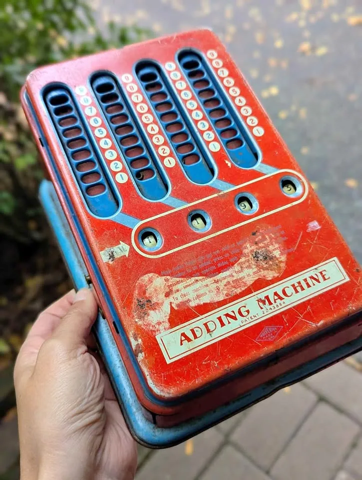 Vintage Wolverine Tin Adding Machine (1940s–50s)